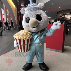 Silver Pop Corn mascot costume character dressed with a Corduroy Pants and Handbags