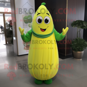 Lemon Yellow Green Bean mascot costume character dressed with a Midi Dress and Gloves