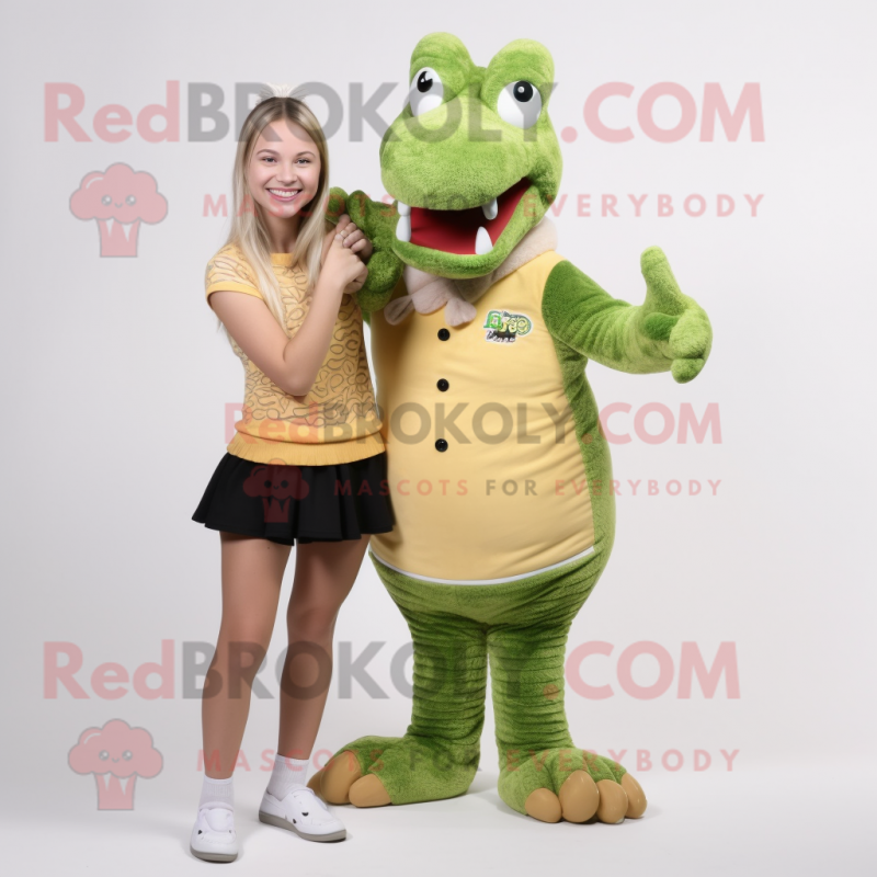 Tan Crocodile mascot costume character dressed with a Mini Skirt and Mittens Tan Crocodile mascot costume character dressed with a Mini Skirt and Mittens