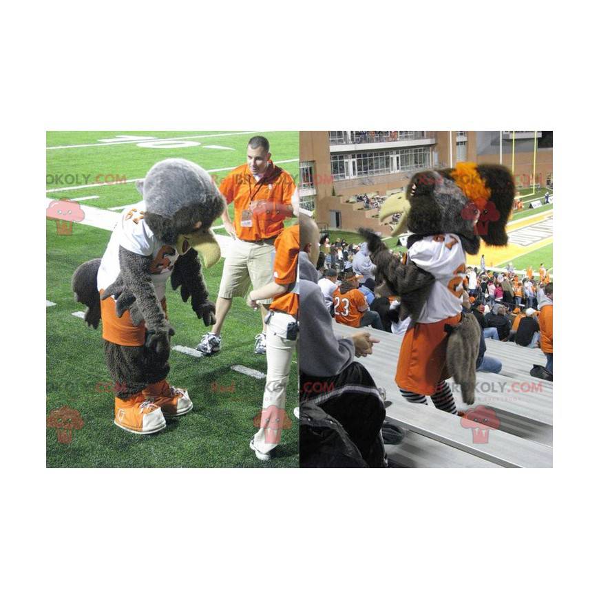 Gray eagle mascot in orange and white sportswear -