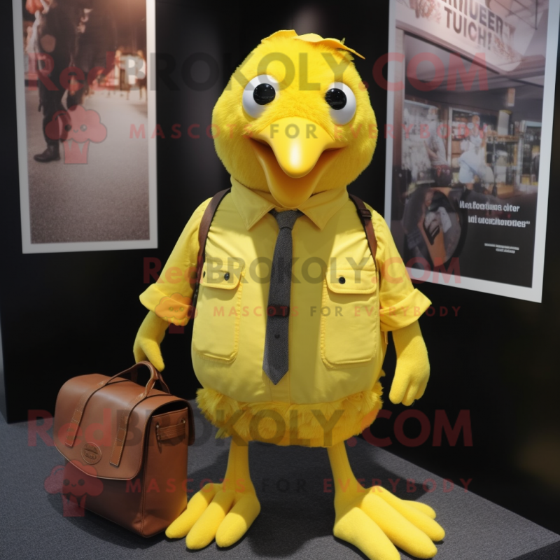 Yellow Crow mascot costume character dressed with a Oxford Shirt and Handbags Yellow Crow mascot costume character dressed with a Oxford Shirt and Handbags