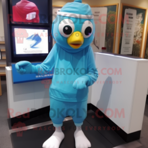 Sky Blue Chicken mascot costume character dressed with a Rash Guard and Beanies