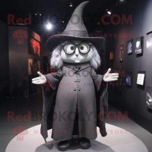 Gray Witch'S Hat mascot costume character dressed with a Leather Jacket and Eyeglasses