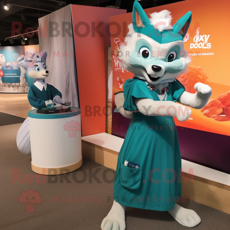 Teal Fox mascot costume character dressed with a Maxi Skirt and Watches