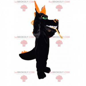 Black dragon mascot with large bright green eyes -