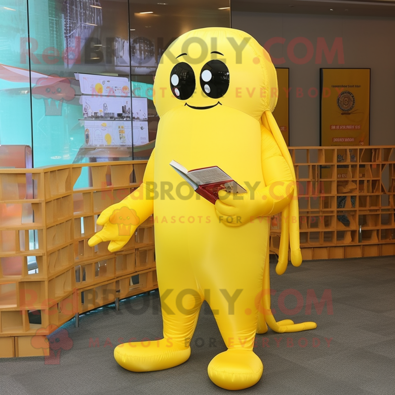 Yellow Jellyfish mascot costume character dressed with a Jumpsuit and Reading glasses