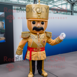Gold British Royal Guard mascot costume character dressed with a Flare Jeans and Brooches