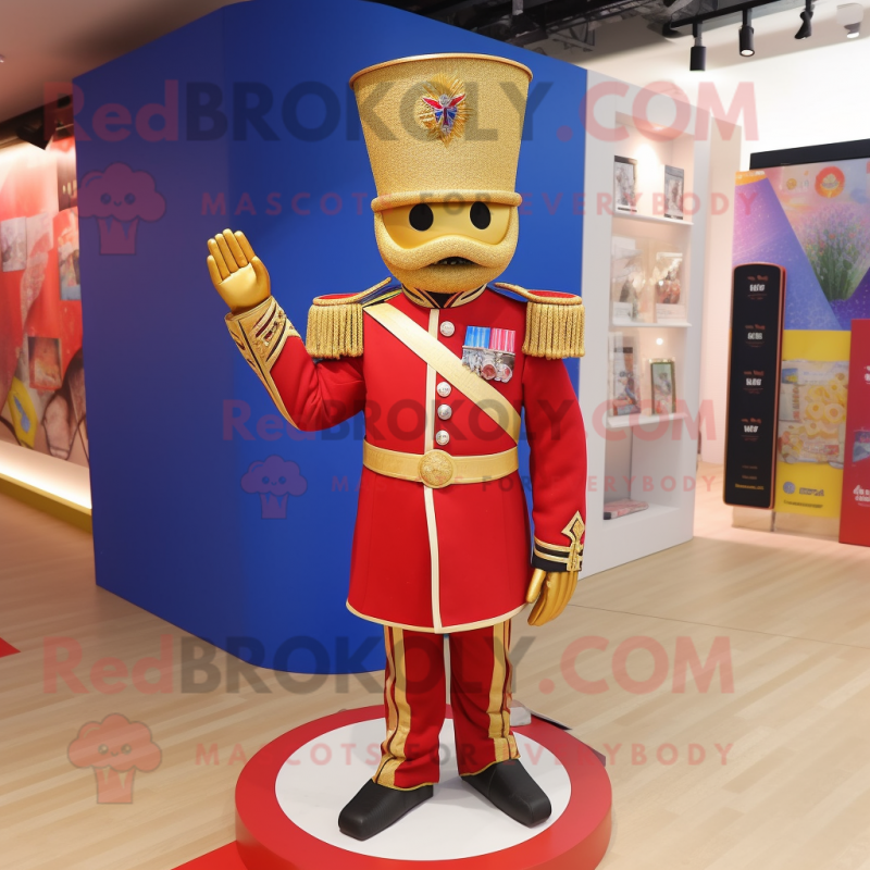 Gold British Royal Guard mascot costume character dressed with a Flare Jeans and Brooches Gold British Royal Guard mascot costume character dressed with a Flare Jeans and Brooches