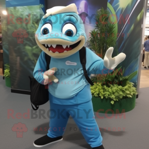 Cyan Barracuda mascot costume character dressed with a Dress Pants and Backpacks