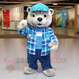 Blue Otter mascot costume character dressed with a Flannel Shirt and Beanies