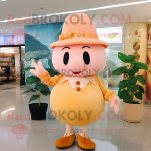 Peach Pumpkin mascot costume character dressed with a Cardigan and Berets