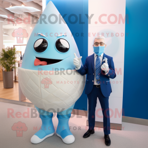 Blue Ice Cream Cone mascot costume character dressed with a Suit Jacket and Watches
