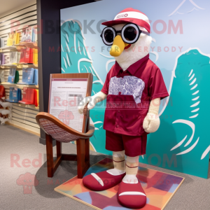 Maroon Swans mascot costume character dressed with a Board Shorts and Reading glasses