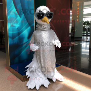 Silver Swan mascot costume character dressed with a Cover-up and Sunglasses