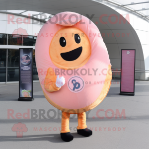 Peach Donut mascot costume character dressed with a Cover-up and Gloves