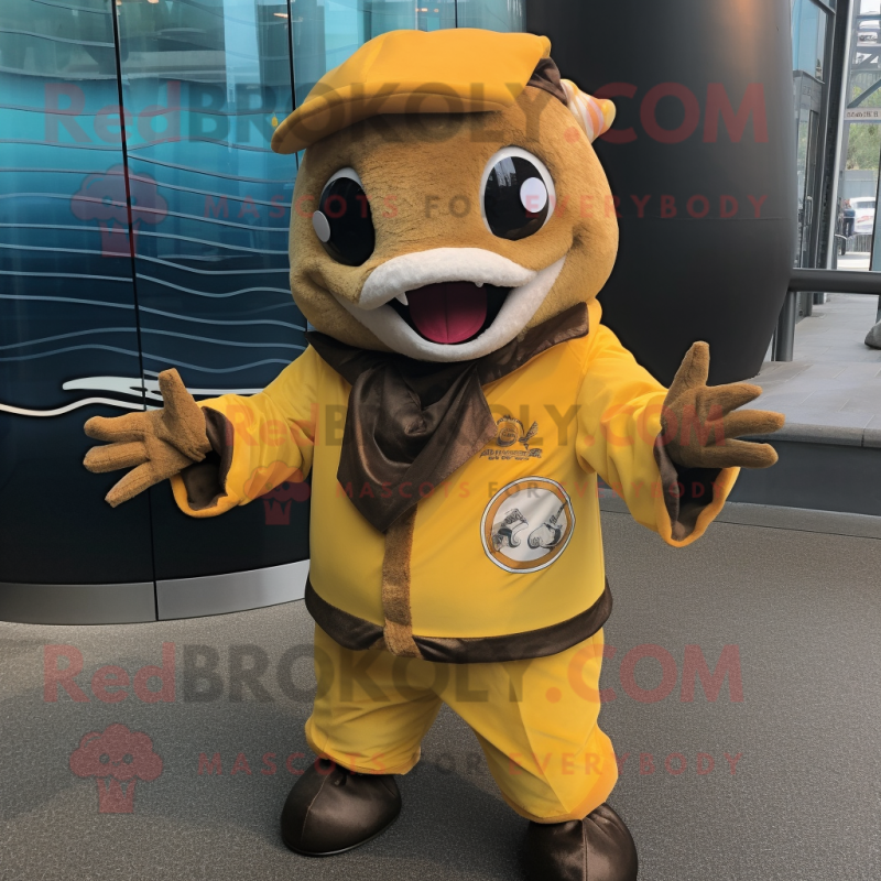 Gold Tuna mascot costume character dressed with a Vest and Gloves