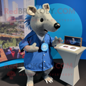 Blue Armadillo mascot costume character dressed with a Button-Up Shirt and Lapel pins