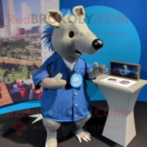 Blue Armadillo mascot costume character dressed with a Button-Up Shirt and Lapel pins