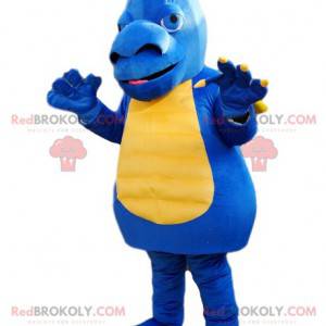 Blå och gul drakmaskot med en stor nosparti - Redbrokoly.com