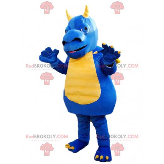 Mascota dragón azul y amarillo con un gran hocico -