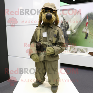 Olive Special Air Service mascot costume character dressed with a Blouse and Brooches