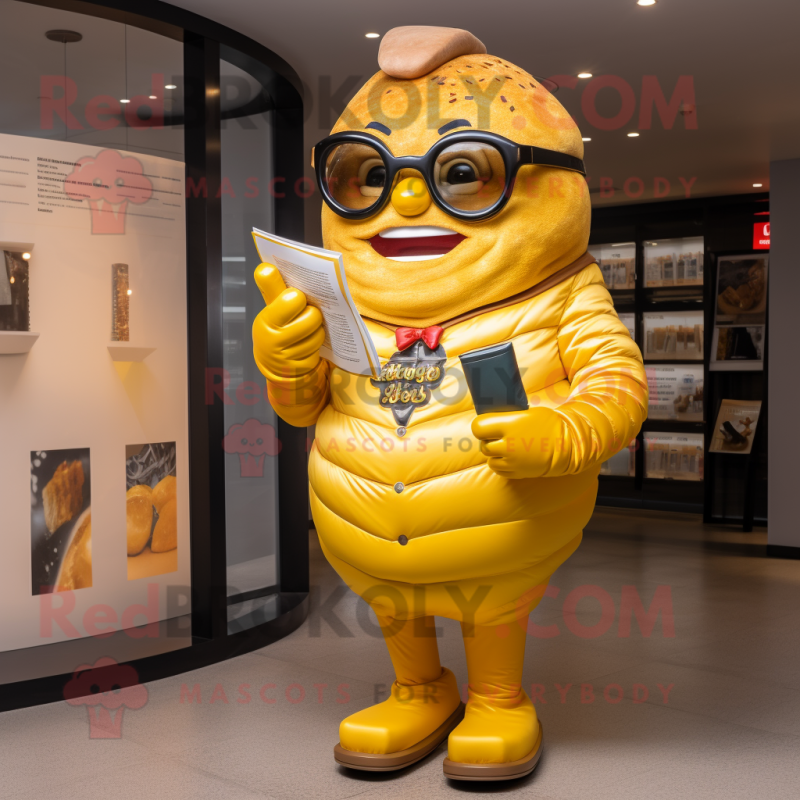 Yellow Croissant mascot costume character dressed with a Leather Jacket and Reading glasses Yellow Croissant mascot costume character dressed with a Leather Jacket and Reading glasses