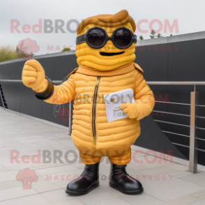 Yellow Croissant mascot costume character dressed with a Leather Jacket and Reading glasses