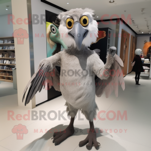 Gray Archeopteryx mascot costume character dressed with a Blouse and Shoe clips