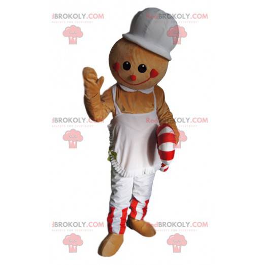 Mascotte uomo beige con un grembiule e zucchero d'orzo -