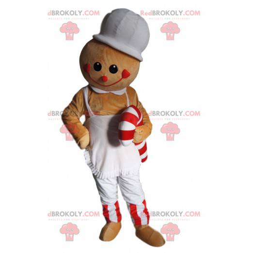 Mascotte uomo beige con un grembiule e zucchero d'orzo -