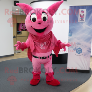 Pink Devil mascot costume character dressed with a Bootcut Jeans and Shawls