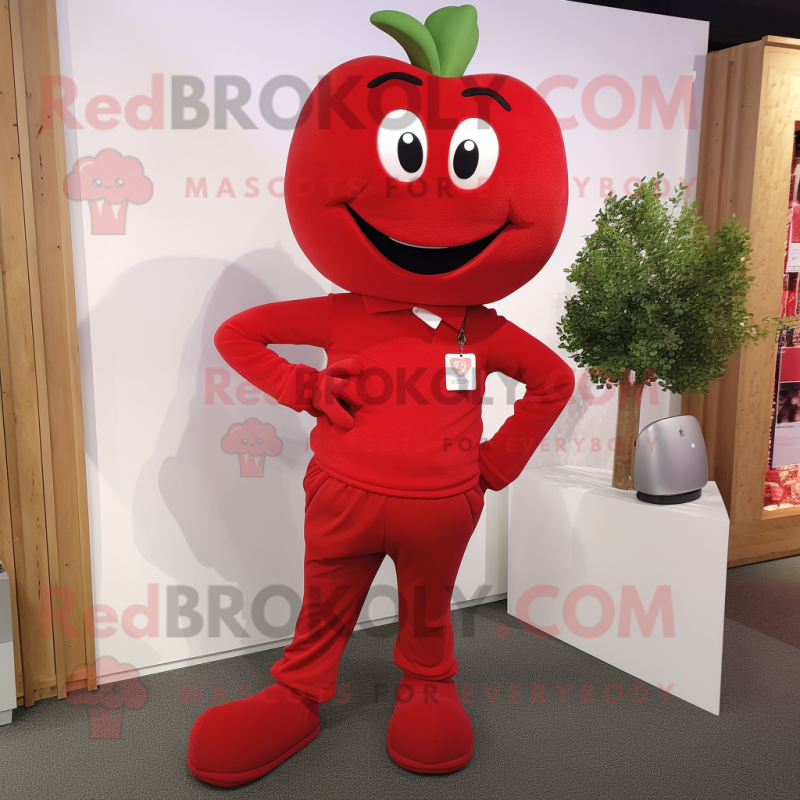 Red Apple mascot costume character dressed with a Chinos and Cufflinks