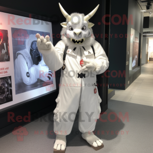 White Devil mascot costume character dressed with a Parka and Tie pins
