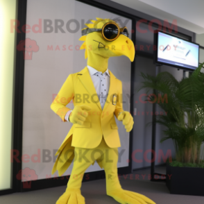 Lemon Yellow Archeopteryx mascot costume character dressed with a Blazer and Digital watches