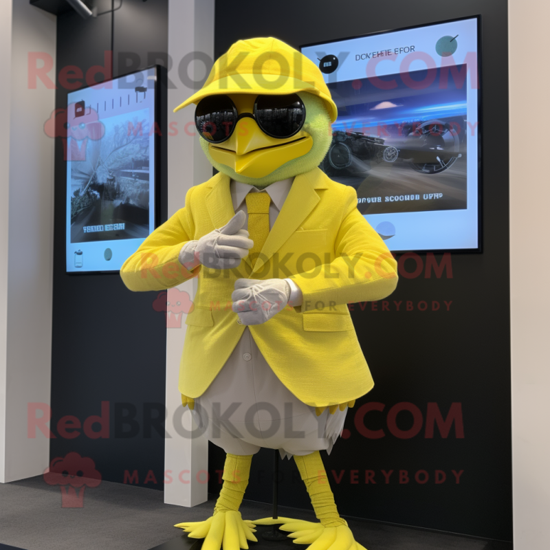 Lemon Yellow Archeopteryx mascot costume character dressed with a Blazer and Digital watches Lemon Yellow Archeopteryx mascot costume character dressed with a Blazer and Digital watches