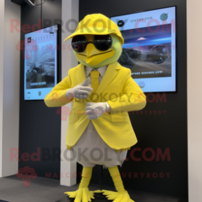 Lemon Yellow Archeopteryx mascot costume character dressed with a Blazer and Digital watches