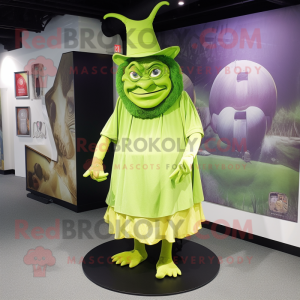 Lime Green Ogre mascot costume character dressed with a Wrap Skirt and Hat pins