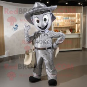 Silver Horseshoe mascot costume character dressed with a Overalls and Handbags
