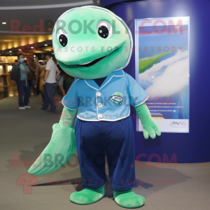 Green Blue Whale mascot costume character dressed with a Polo Shirt and Suspenders