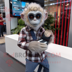 Silver Capuchin Monkey mascot costume character dressed with a Flannel Shirt and Smartwatches