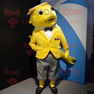 Yellow Cod mascot costume character dressed with a Polo Shirt and Pocket squares