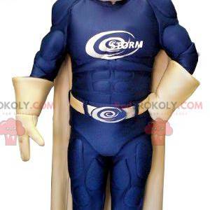 Mascotte del supereroe con un costume blu e oro - Redbrokoly.com