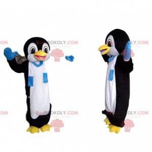 Morsom pingvin maskot med et blått og hvitt skjerf -