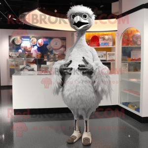 Silver Ostrich mascot costume character dressed with a Long Sleeve Tee and Coin purses