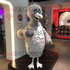 Silver Ostrich mascot costume character dressed with a Long Sleeve Tee and Coin purses