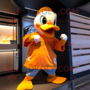 Orange Duck mascot costume character dressed with a Graphic Tee and Keychains