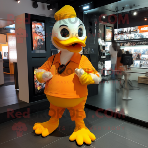 Orange Duck mascot costume character dressed with a Graphic Tee and Keychains