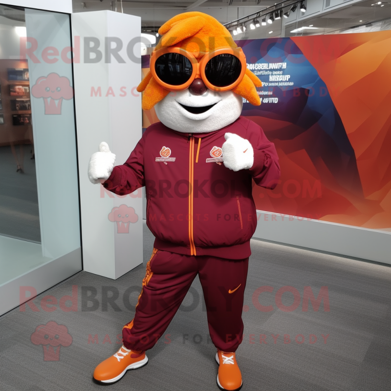 Maroon Orange mascot costume character dressed with a Windbreaker and Bracelet watches