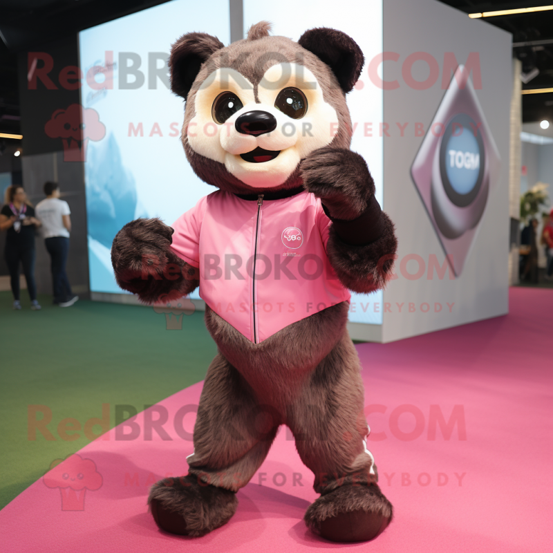 Pink Spectacled Bear mascot costume character dressed with a Jeggings and Smartwatches Pink Spectacled Bear mascot costume character dressed with a Jeggings and Smartwatches