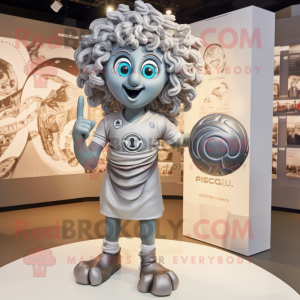 Silver Medusa mascot costume character dressed with a Rugby Shirt and Rings